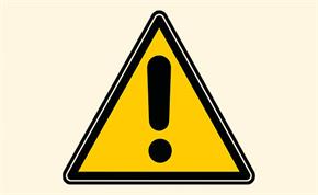 Yellow triangle warning sign with black exclamation mark