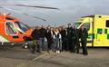 Photo: Magpas Air Ambulance, Doctor Rupert Hurry and Critical Care Paramedic, Dan Read with Alice's sisters, former patient Alice Lunn, Alice's parents and EEAST Ambulance Service Paramedics, Adam Bright, Napoleon Georgoulias and Charlie Harris