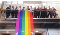 EEAST staff with the Pride flag