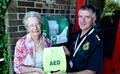 Hempton defibrillator Margaret Carter with Andrew Barlow web